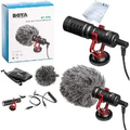 BOYA MM1 compact black microphone with red suspension mount, furry windshield, cables, pouch and retail box in a product collage