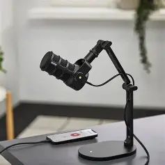 Black RØDE DS2 desktop studio arm with microphone mounted above its freestanding base; microphone shown for demonstration