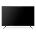 AI-edited Vitron 50-inch TV alone with screen off on white; no gifts shown.