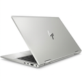 Silver HP laptop viewed from a rear three-quarter angle on white.