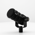 AI-generated unpacked product view of a black RØDE PodMic USB microphone with attached swivel mount