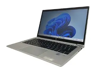 Silver HP laptop open at an angle on a white background.